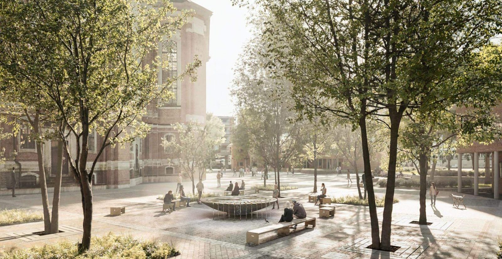 Der Kirchplatz des Michel nach der Umgestaltung. Zu sehen sind Sitzbänke, Bäume und der Brunnen.